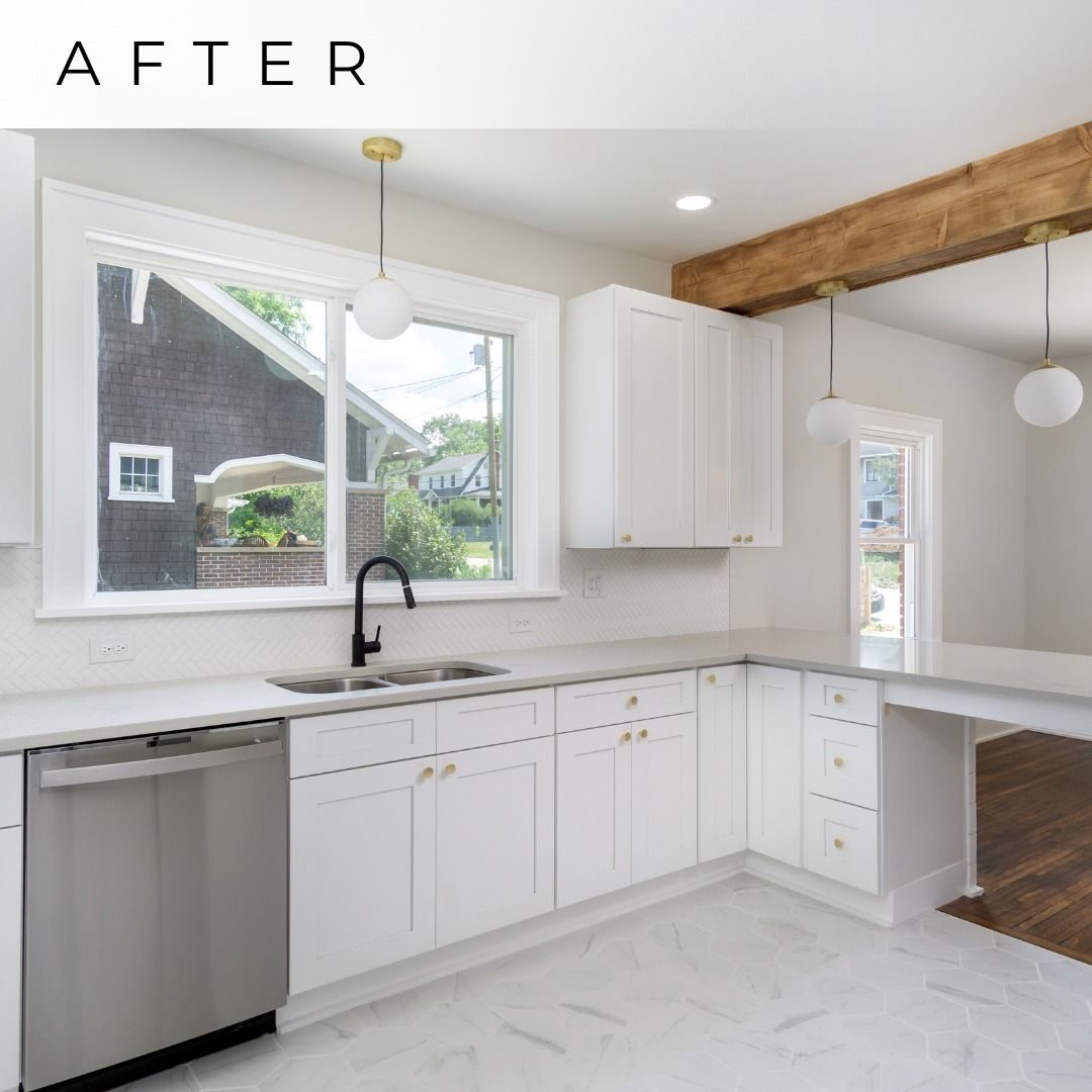 Remodeled kitchen with white shaker cabinets, quartz counters and a timber beam