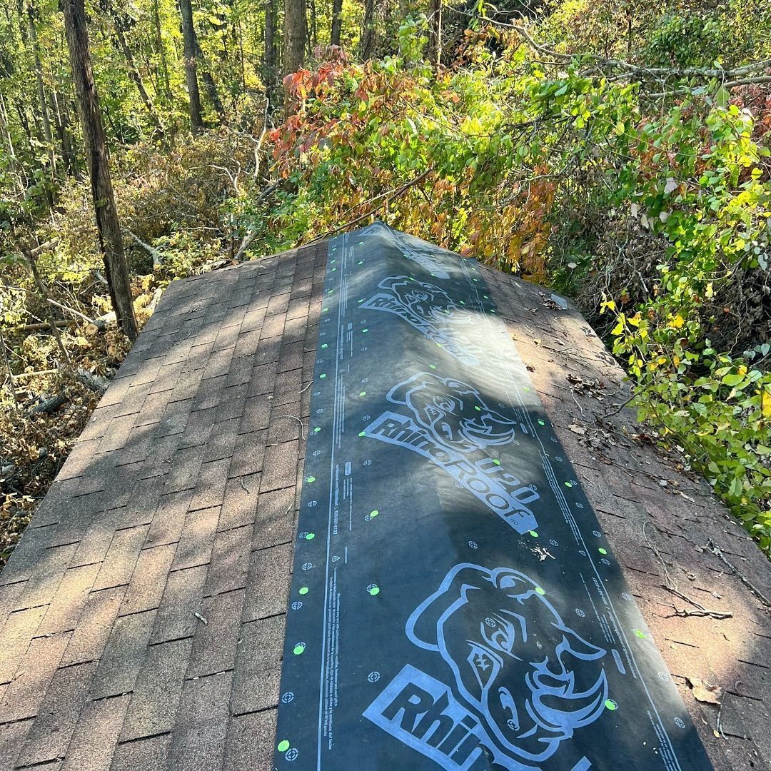 Roof replacement with new synthetic underlayment over the decking